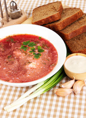 Delicious borsch on table close-up