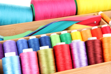 Sewing accessories in wooden box close up