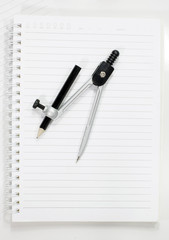 School supply set isolated on notebook