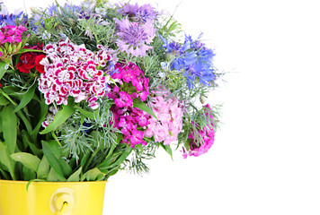 Beautiful bouquet in pail isolated on white