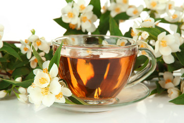 Cup of tea with jasmine, isolated on white