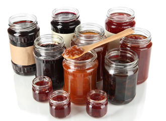 Tasty jam in banks isolated on white