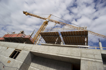 Fototapeta premium Balanced Tower Construction Crane Installed Foundation Building A