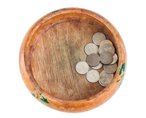 The wooden bowl with money