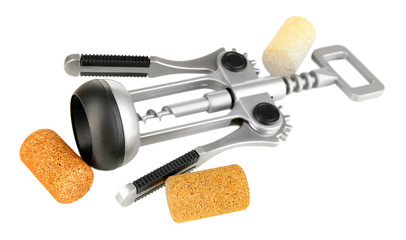 Corkscrew with wine corks isolated on white