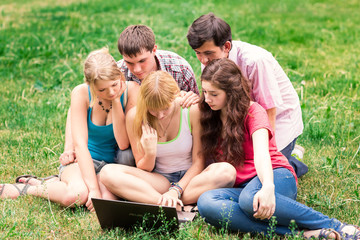 Fototapeta premium Group of happy smiling Teenage Students Outside College