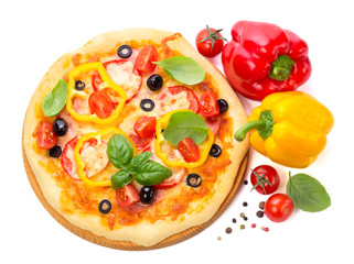 Pizza with ham, tomato and olives and vegetables isolated on whi