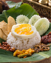 nasi lemak , malay traditional rice meal served with egg