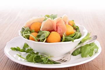 plate of melon salad and prosciutto