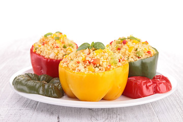 cooked bell pepper with couscous and vegetable