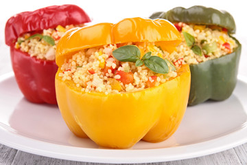 cooked bell pepper with couscous and vegetable