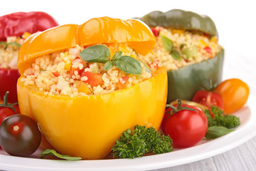 cooked bell pepper with couscous and vegetable