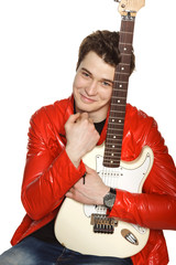 Man feeling happy while embracing his white electric guitar