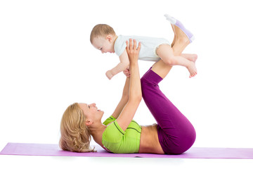 mother with baby doing gymnastics and fitness exercises