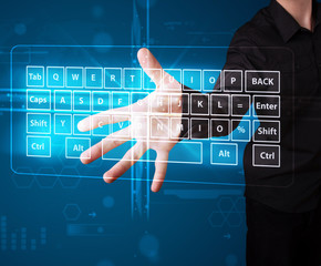 Businessman pressing virtual type of keyboard