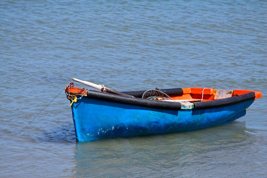 Wooden fishing boat on water