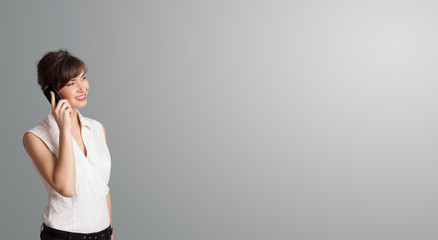 pretty woman making phone call with copy space