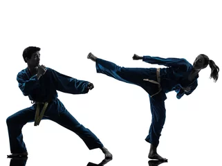 Fotobehang Vechtsport karate vietvodao vechtsporten man vrouw paar silhouette