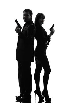 couple woman man detective secret agent criminal  silhouette