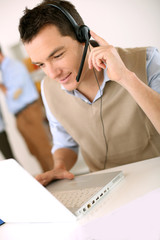 Portrait of customer service representative on the phone