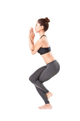 Obraz premium woman making a Yoga pose: Eagle Pose – Garurasana