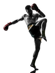 Fototapeta na wymiar one man exercising thai boxing silhouette