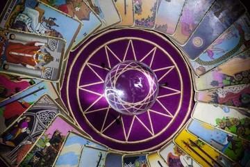 Tarot card reading with crystal ball. © I.Ivan