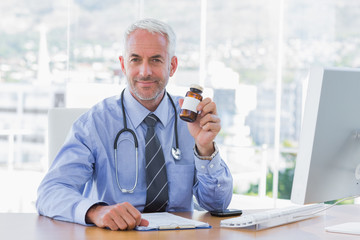 Doctor holding medicine jar