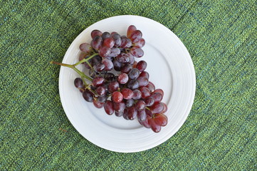 Grapes in a white plate
