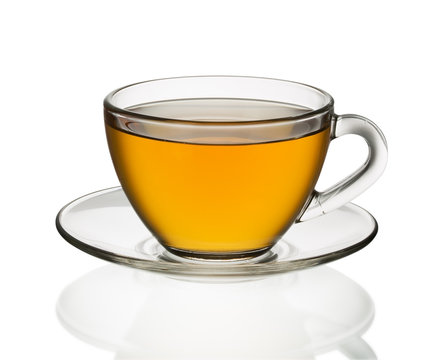 Transparent cup of tea isolated on white