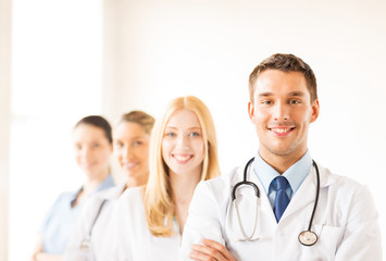 male doctor in front of medical group