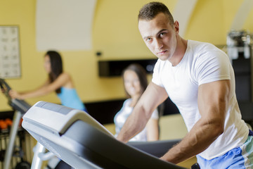 Young man training in the gym