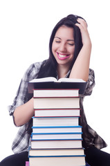 Girl student with books on white