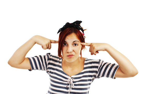 Young Woman Taps One's Forehead On White Background