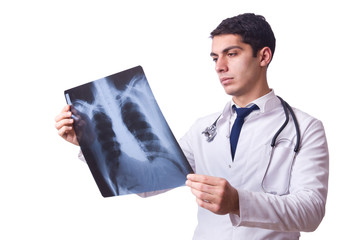Young doctor with x-ray image on white