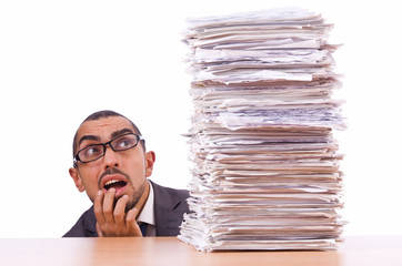 Busy businessman with lots of papers