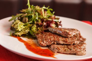 steak with salad