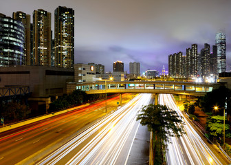 Fototapeta na wymiar Traffic on highway at night