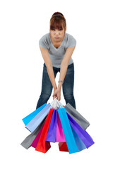 Isolated Young Asian woman with Shopping Bags