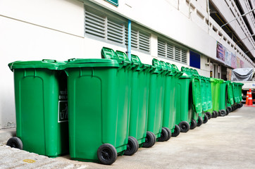 large green trash cans