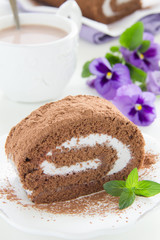 Chocolate roll with cream.