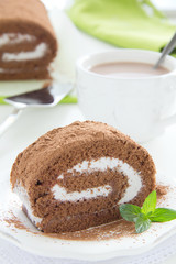 Chocolate roll with cream.