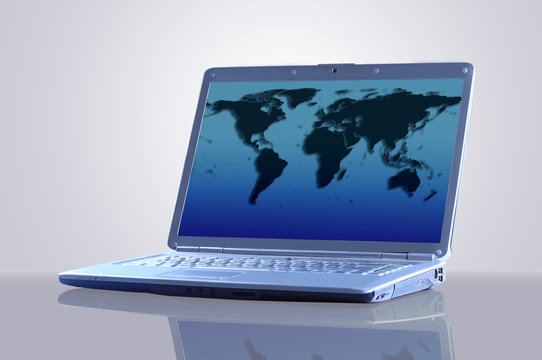 Laptop with a map of the world.