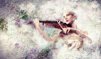 Gorgeous woman playing violin