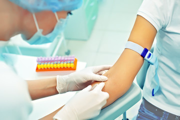 nurse preparing to make  an injection for blood taking. Medical