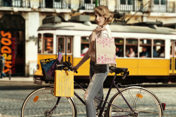 Fototapeta na wymiar sexy woman shopping in bicycle