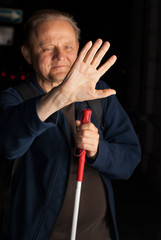 Body language - Blind man showing Stop gesture
