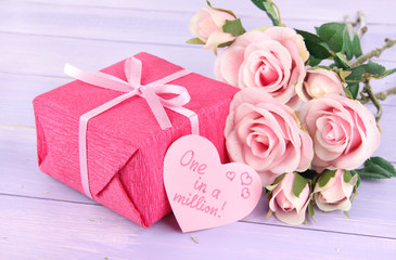 Romantic parcel on wooden background