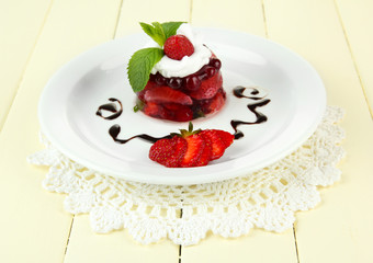 Tasty jelly dessert with fresh berries,