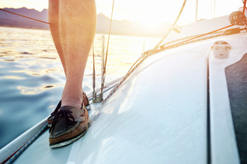 sunrise sailing boat